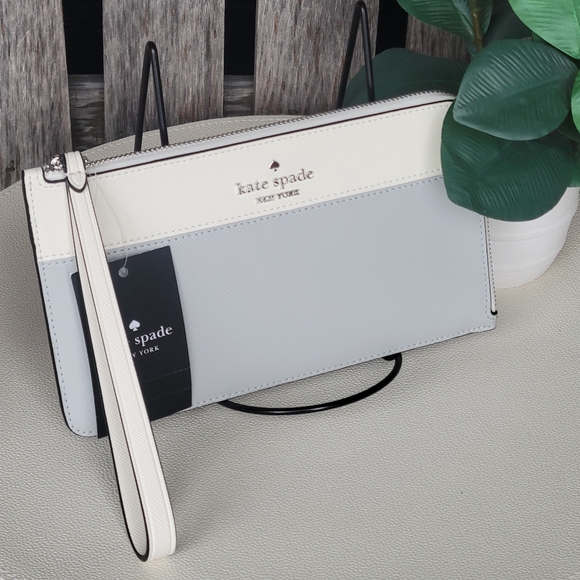 kate spade Handbags - Kate Spade Lucy Platinum Gray & Cream L-zip Wristlet